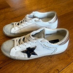 Women’s Golden Goose super-star sneaker.